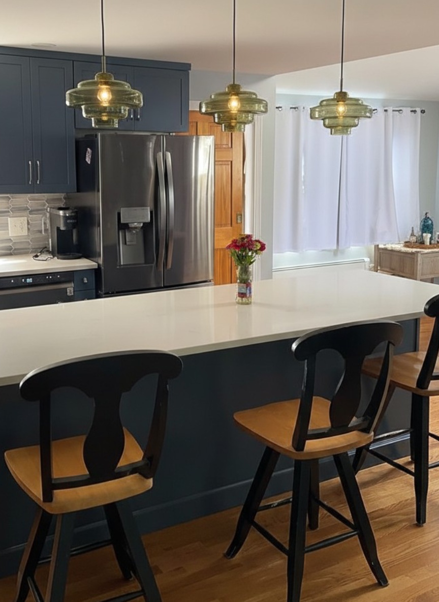 Customer kitchen island with green glass pendant lights