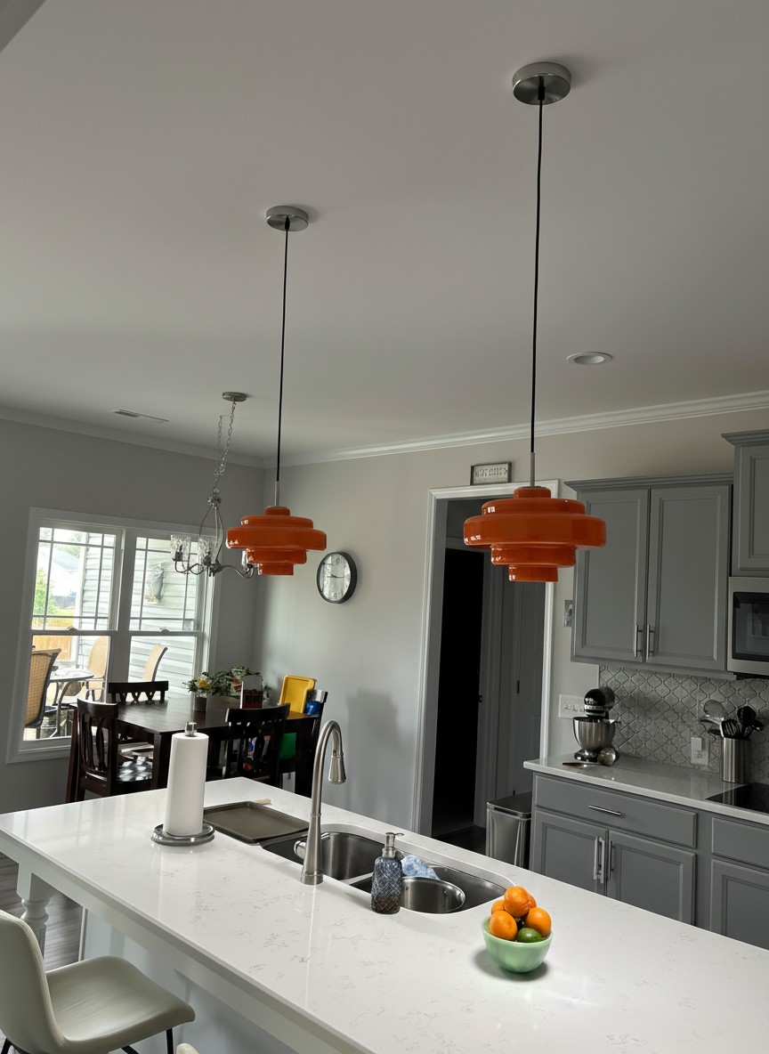 Customer kitchen photo with orange pendant lights