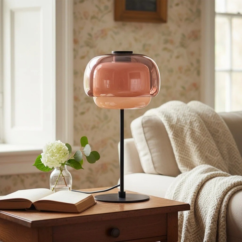 Pink Clinco table lamp on a bedside table