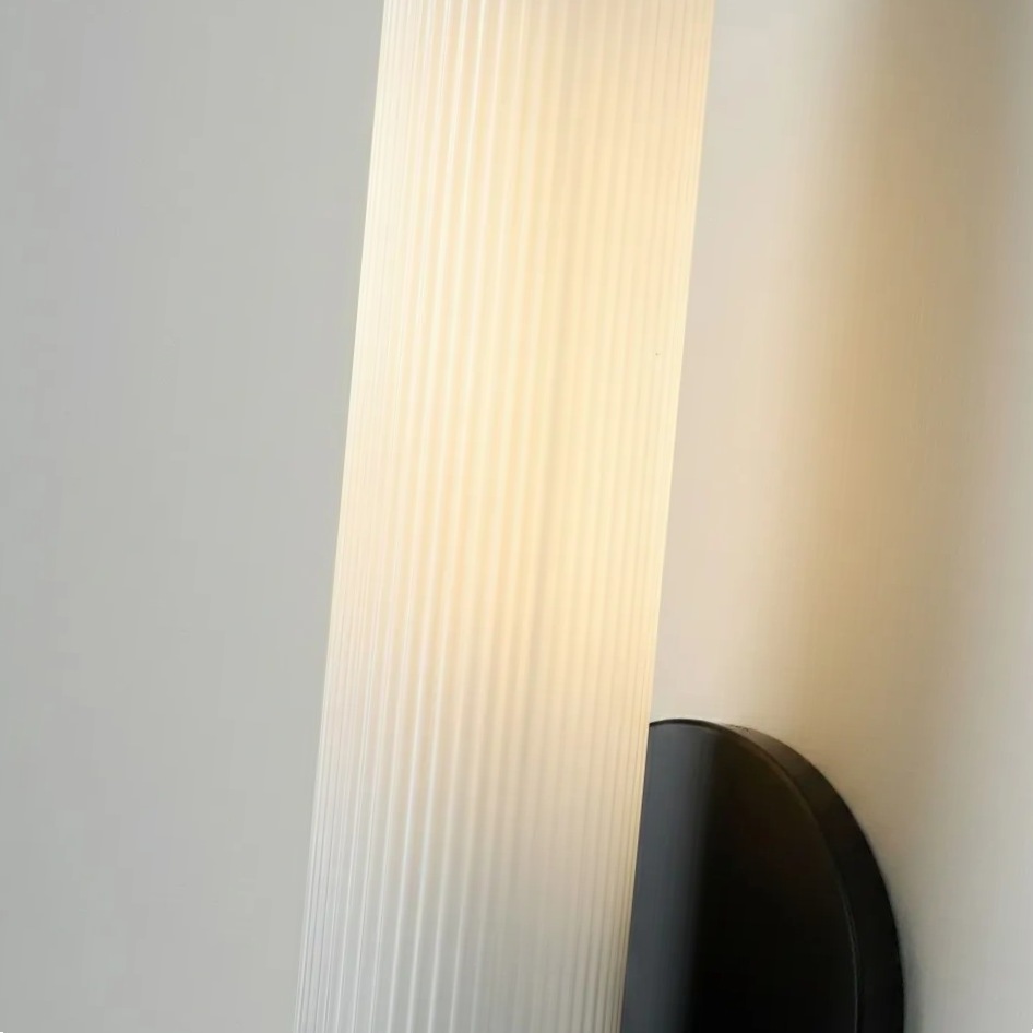 Close view of the illuminated ribbed glass shade