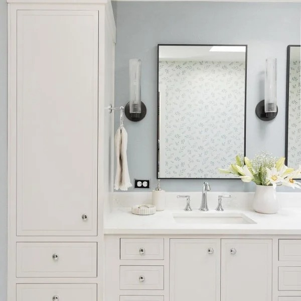 Customer bathroom installation with Rivora sconces