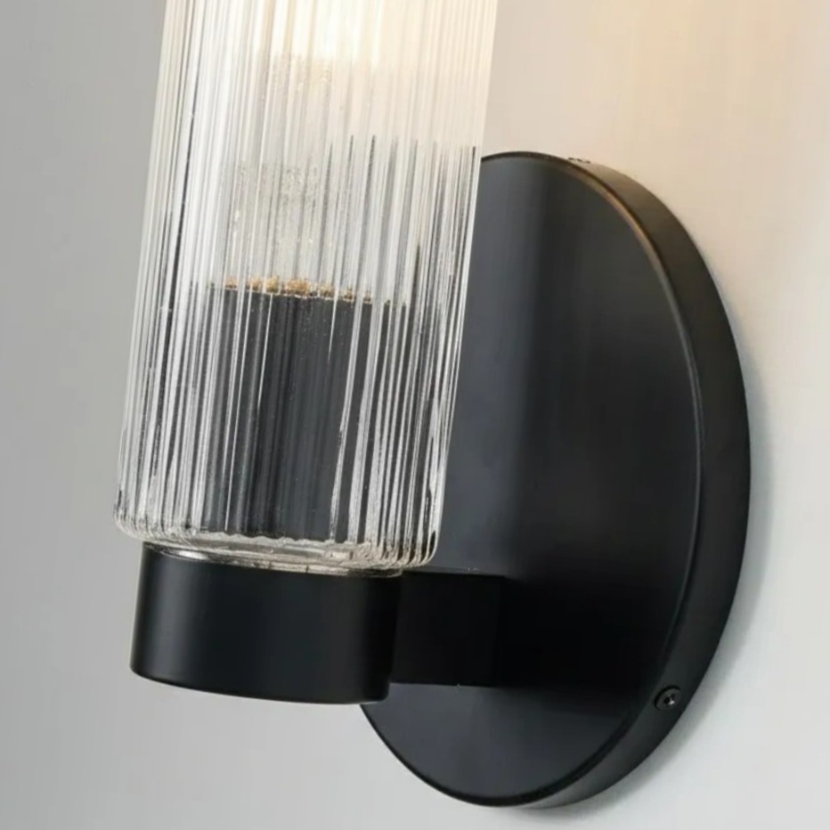 Rivora wall sconce glass and black metal detail