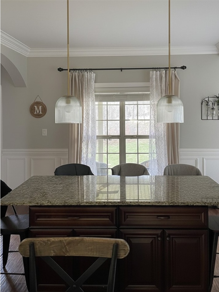 Customer dining island with two Bravira pendant lights
