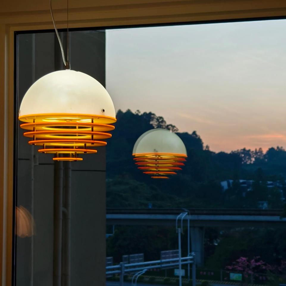 Pendant lamp reflected in evening glass