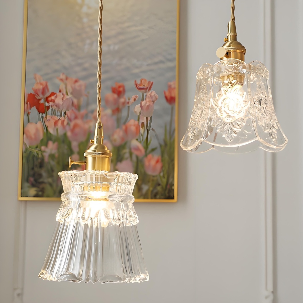 Two Japanese glass pendant lights installed in a softly styled interior