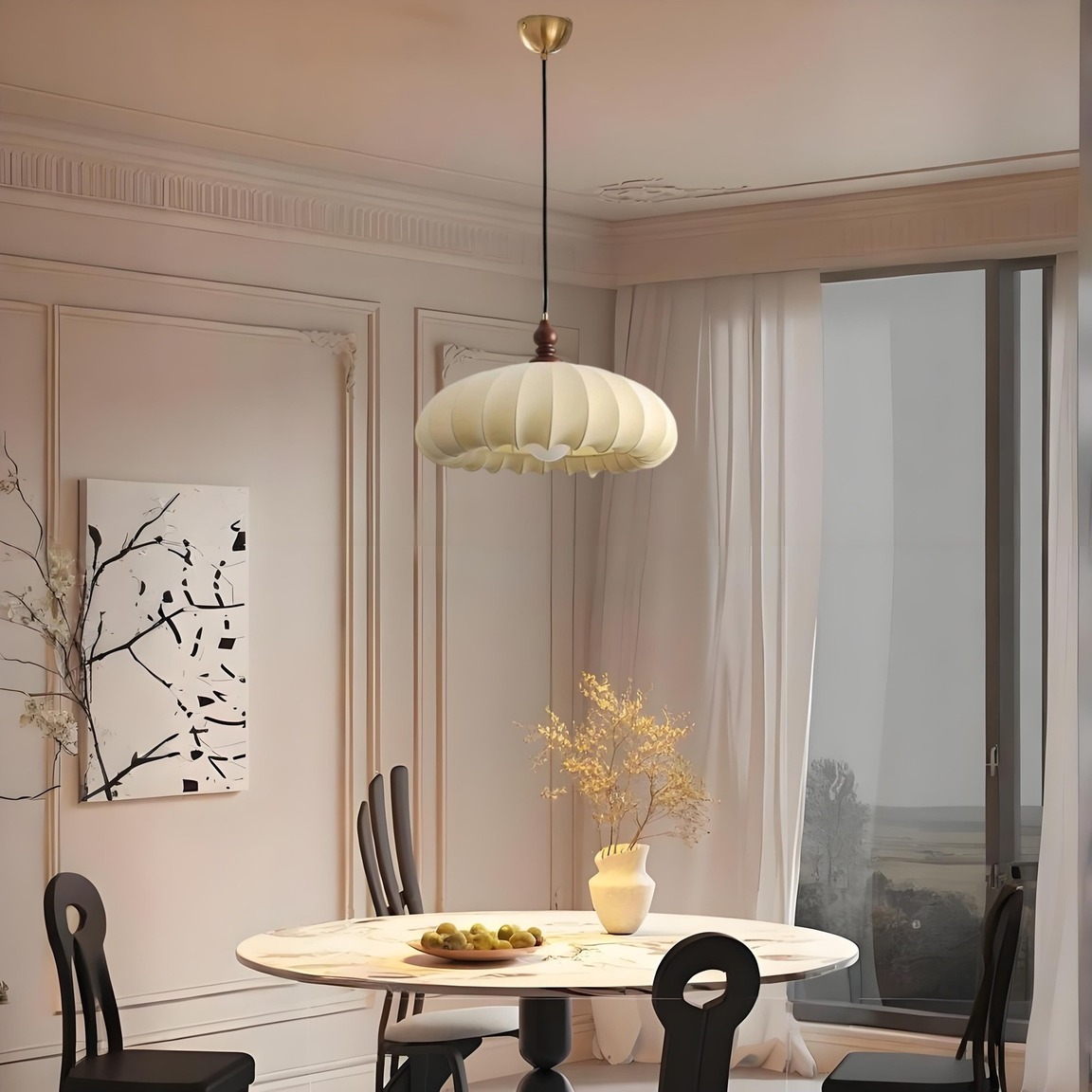 Pleated pendant light hanging above a dining table