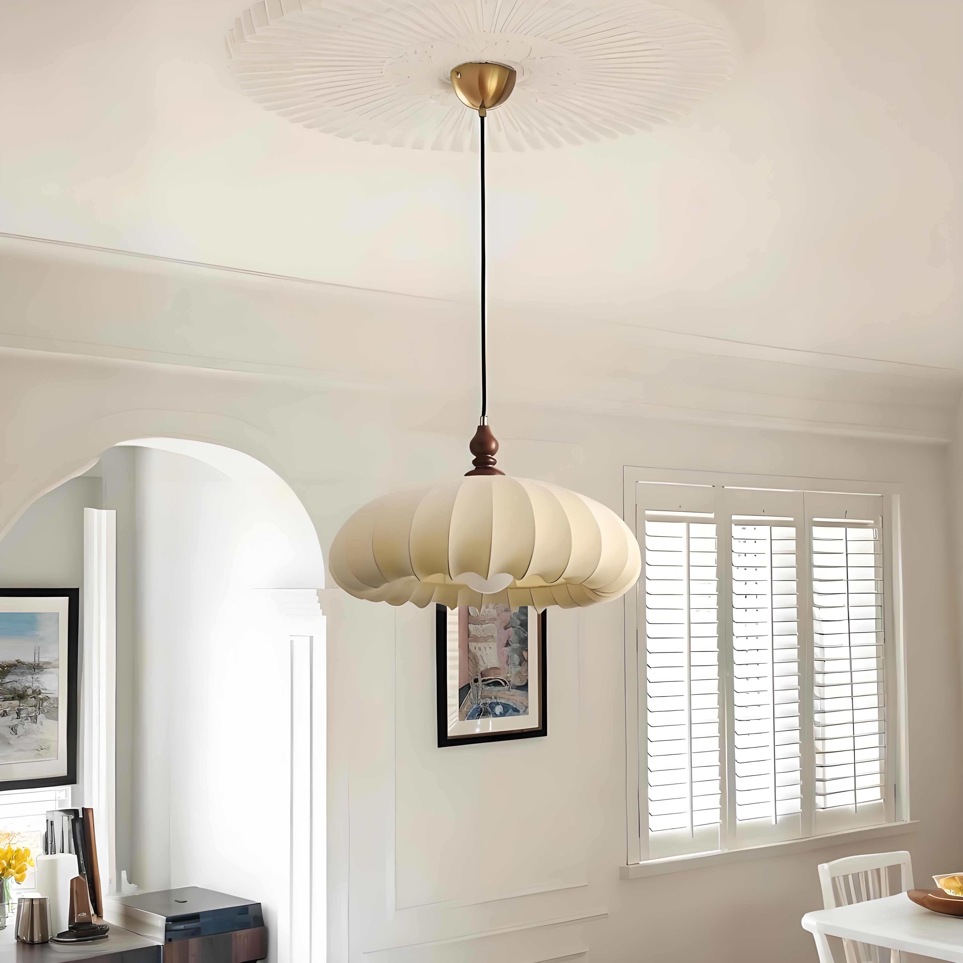 Wood and fabric pendant lamp in a living and dining area scene
