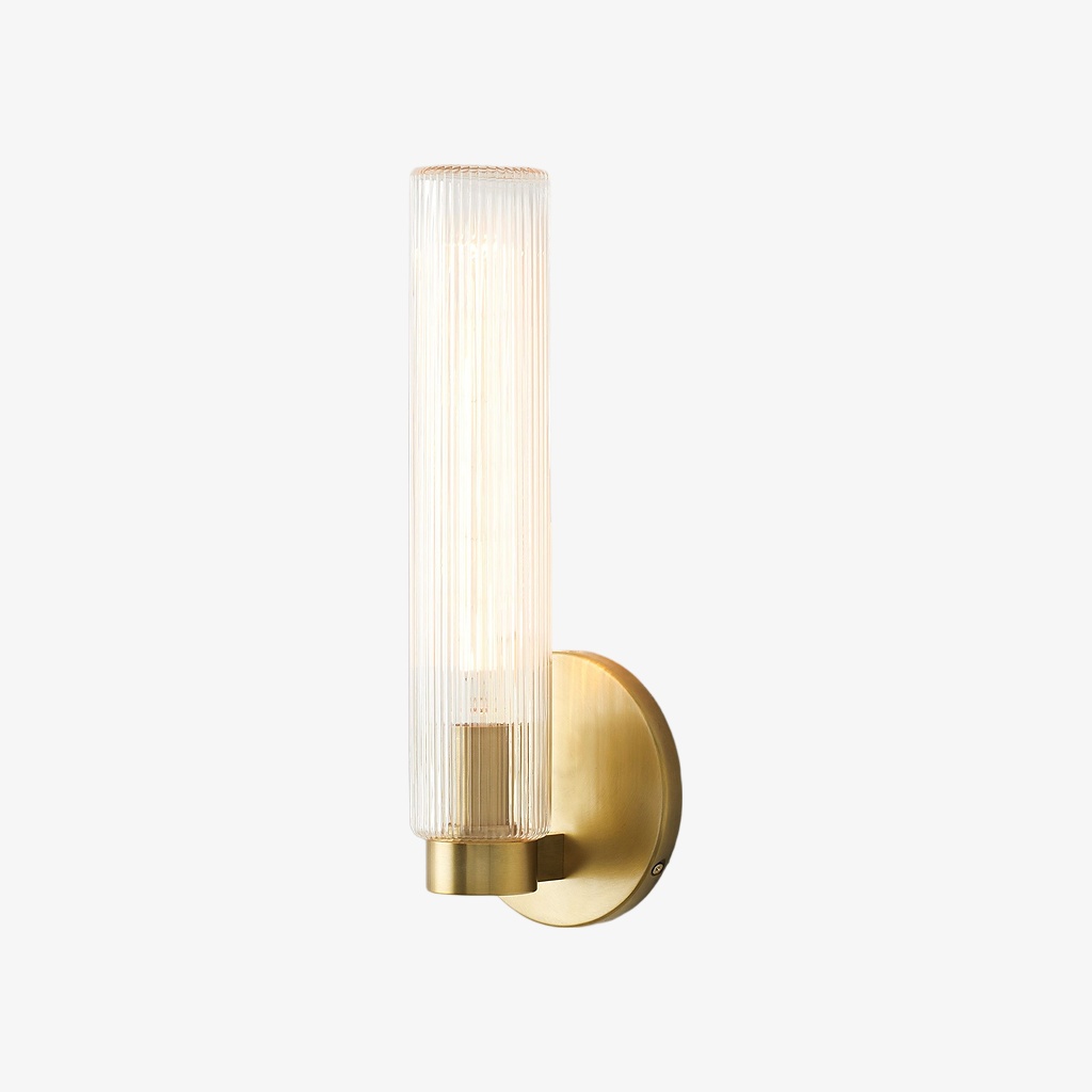 Clear glass Rivora sconce with antique brass finish