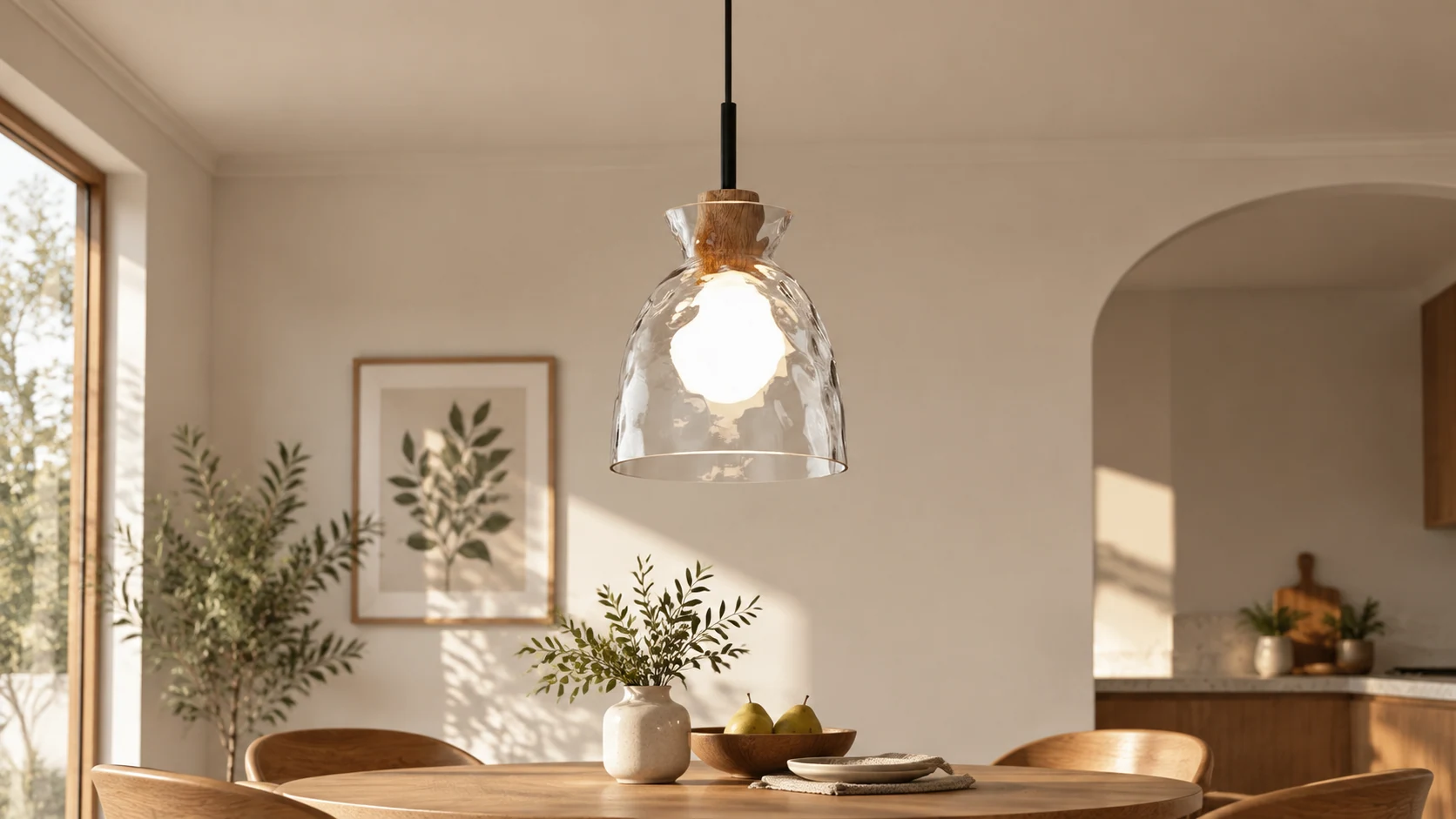 Quenora Ripple pendant light installed above a dining setting
