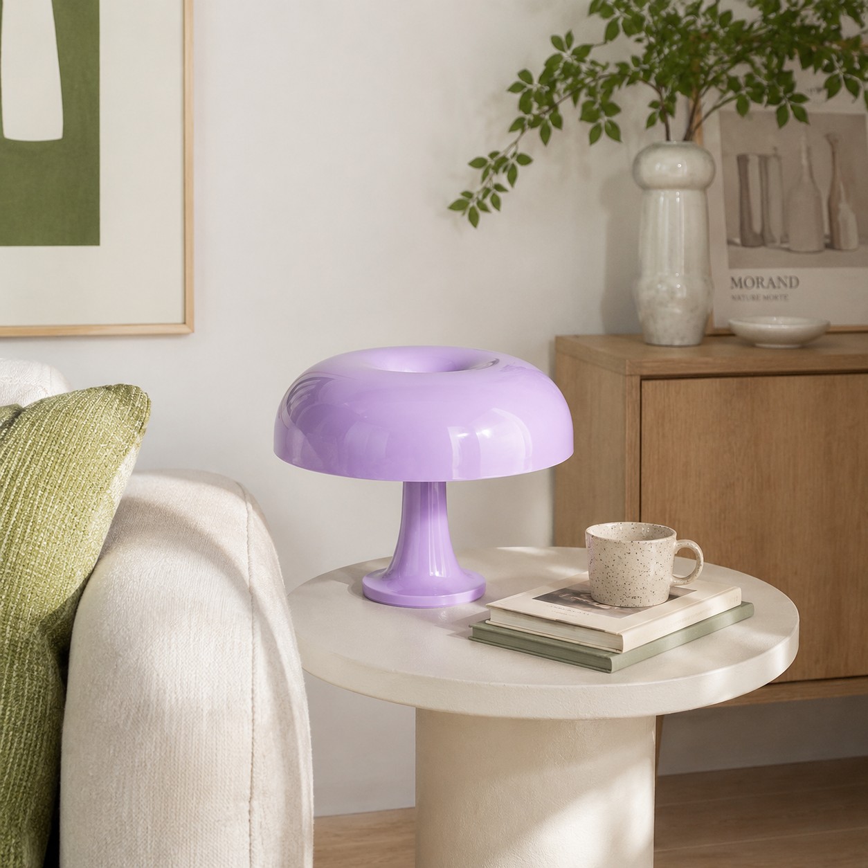 Lavender mushroom table lamp on a round side table in a living area
