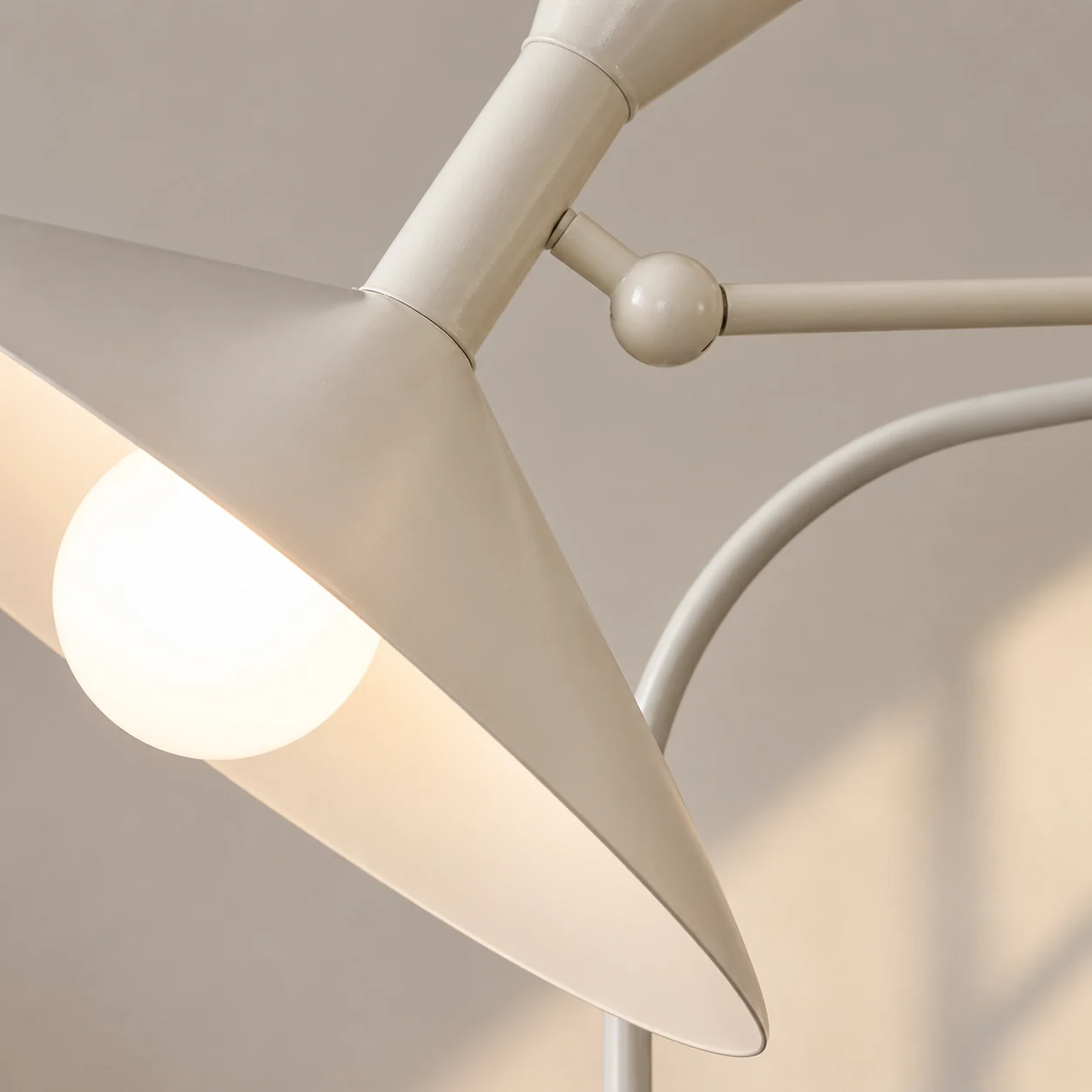 Close-up view of the Marseille sconce metal finish and articulated construction