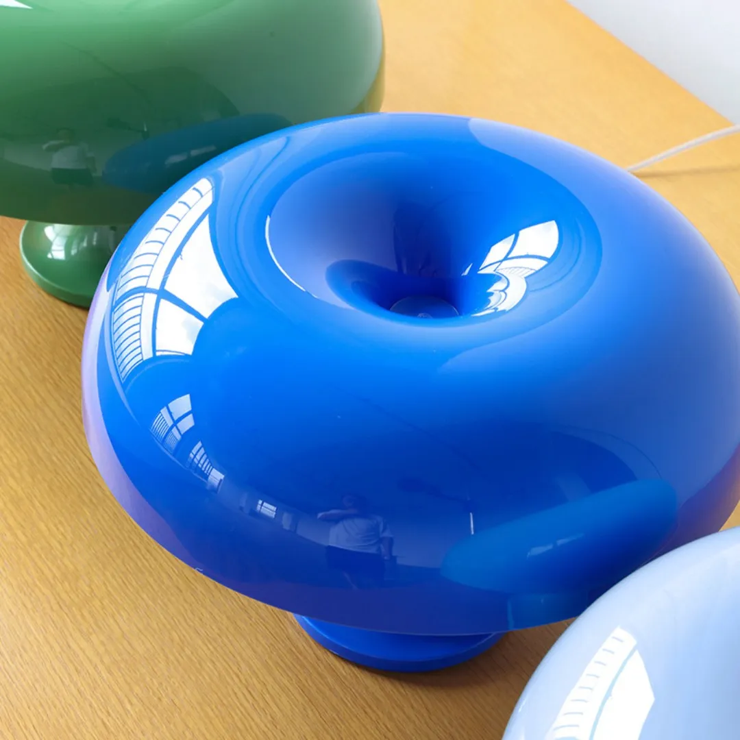 Glossy acrylic surface and central opening of the mushroom table lamp