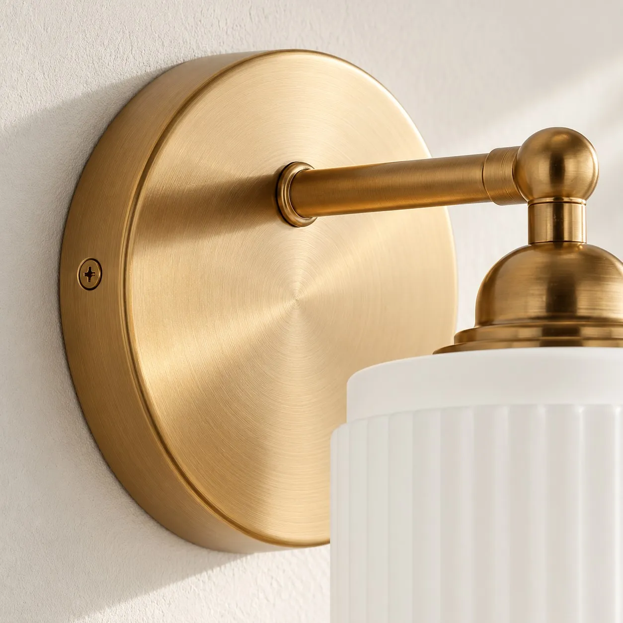 Brass backplate and metal arm detail
