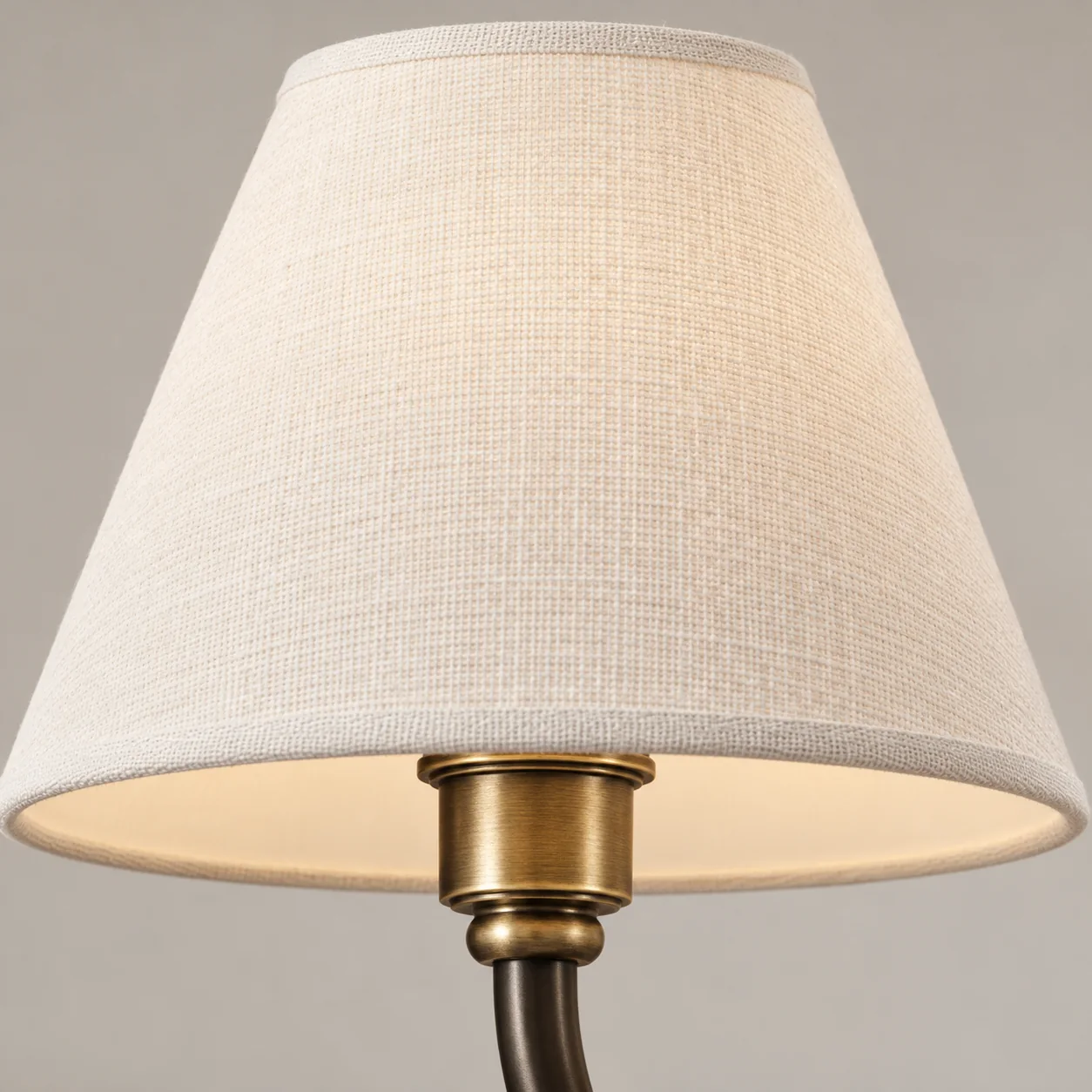 Close-up of the white linen lampshade and metal collar