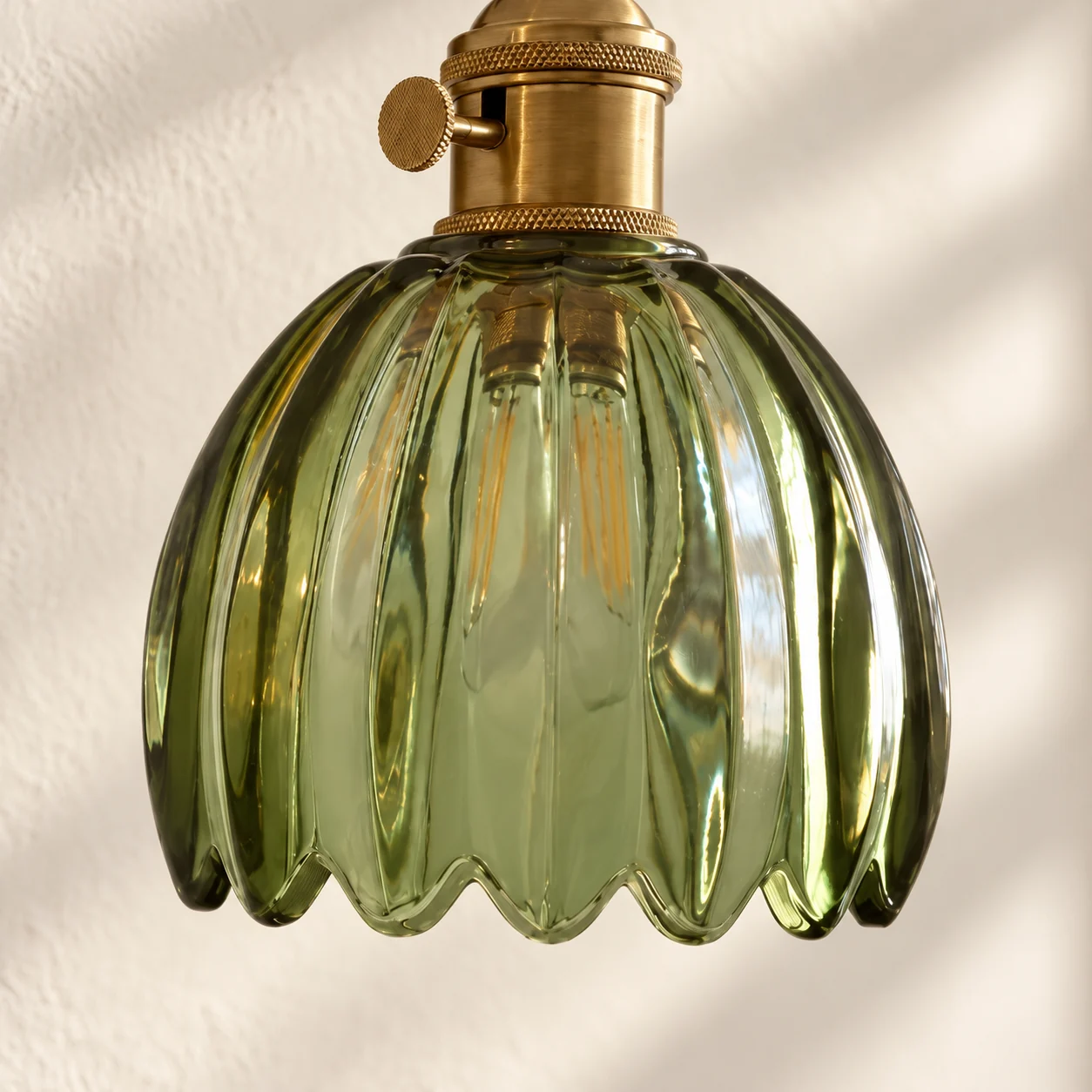 Close-up of the fluted tulip glass shade and scalloped rim