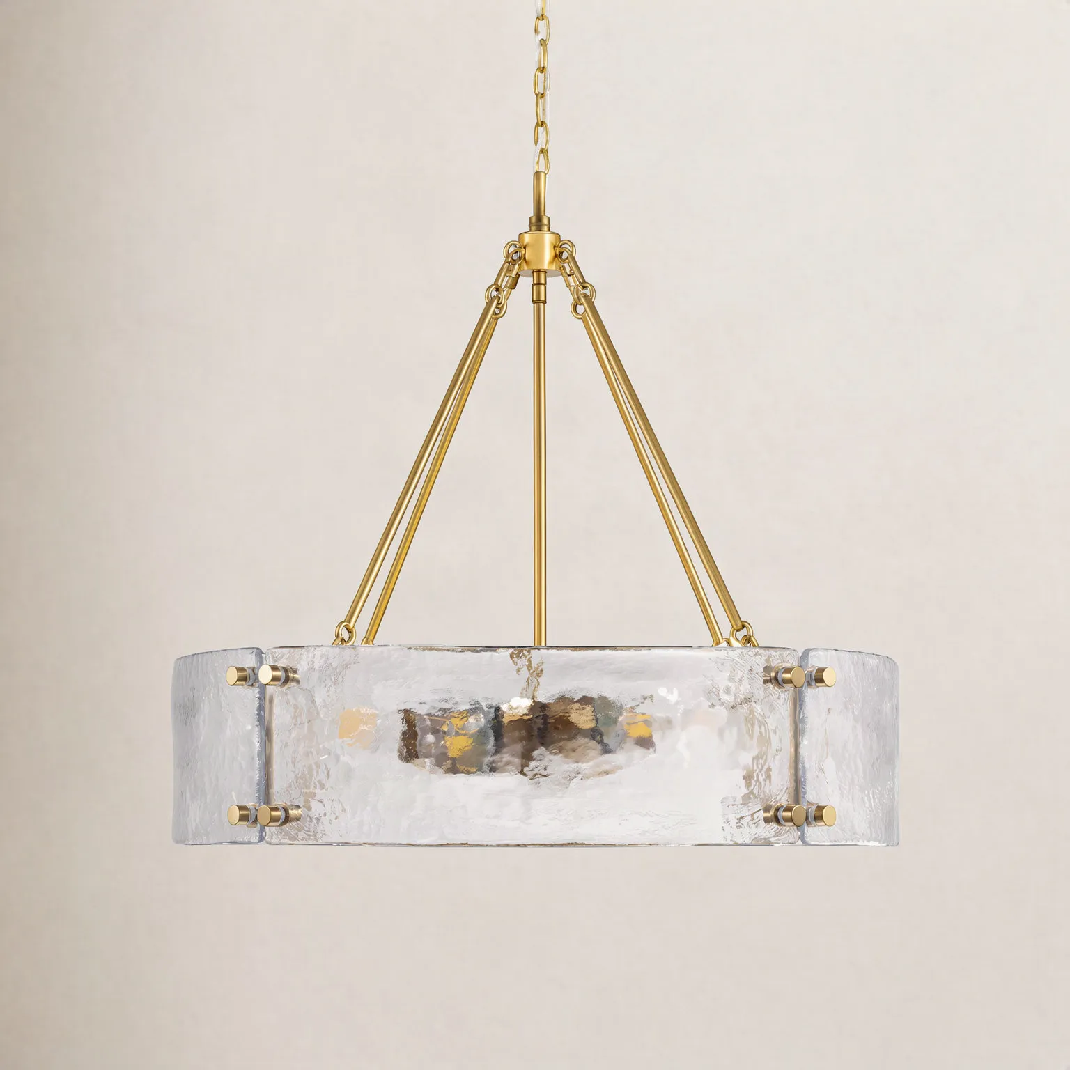 Clear hammered glass drum with antique brass pins