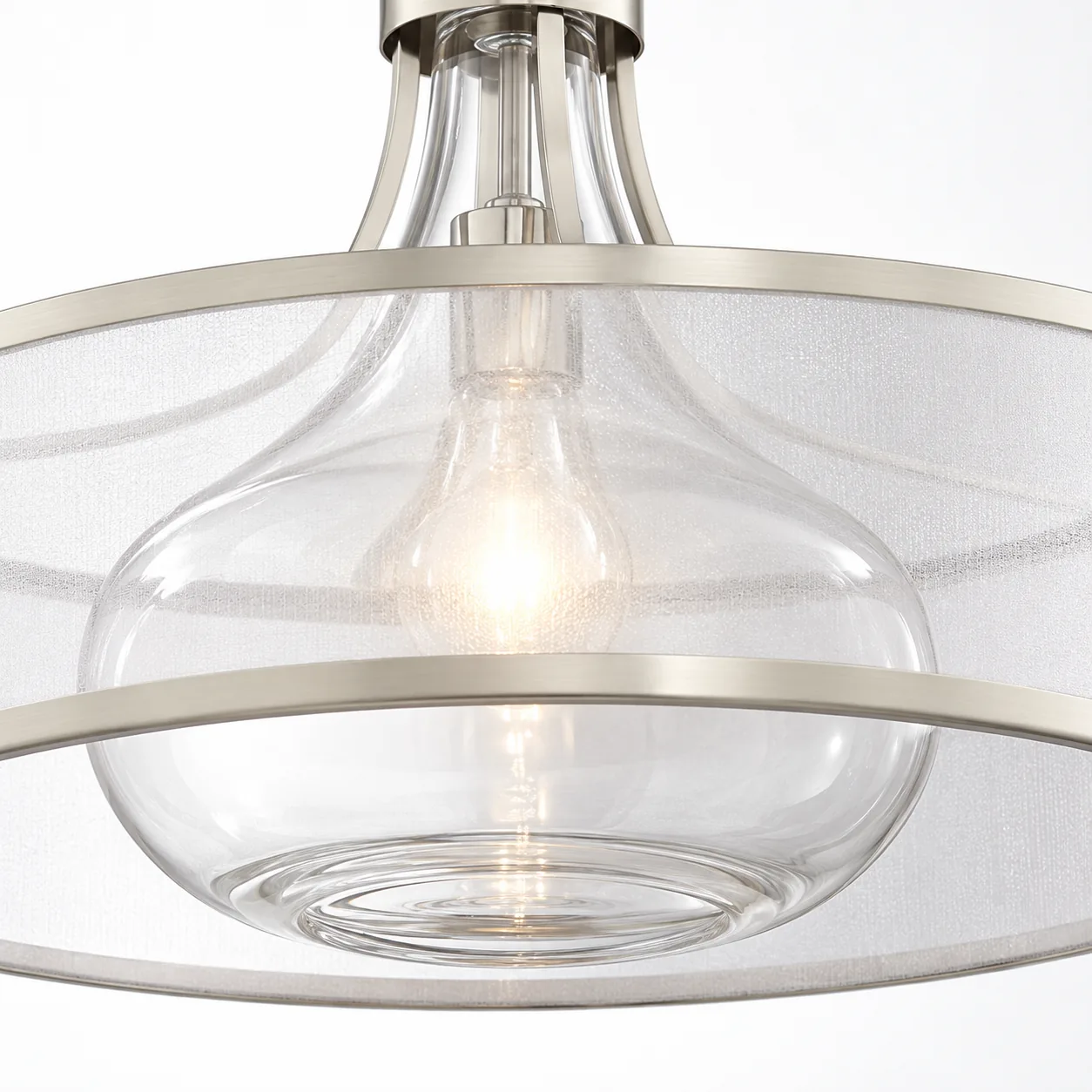 Close view of the curving clear glass inner shade