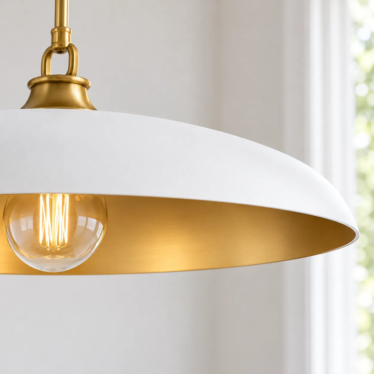 Close view of the shallow disc shade and brass interior