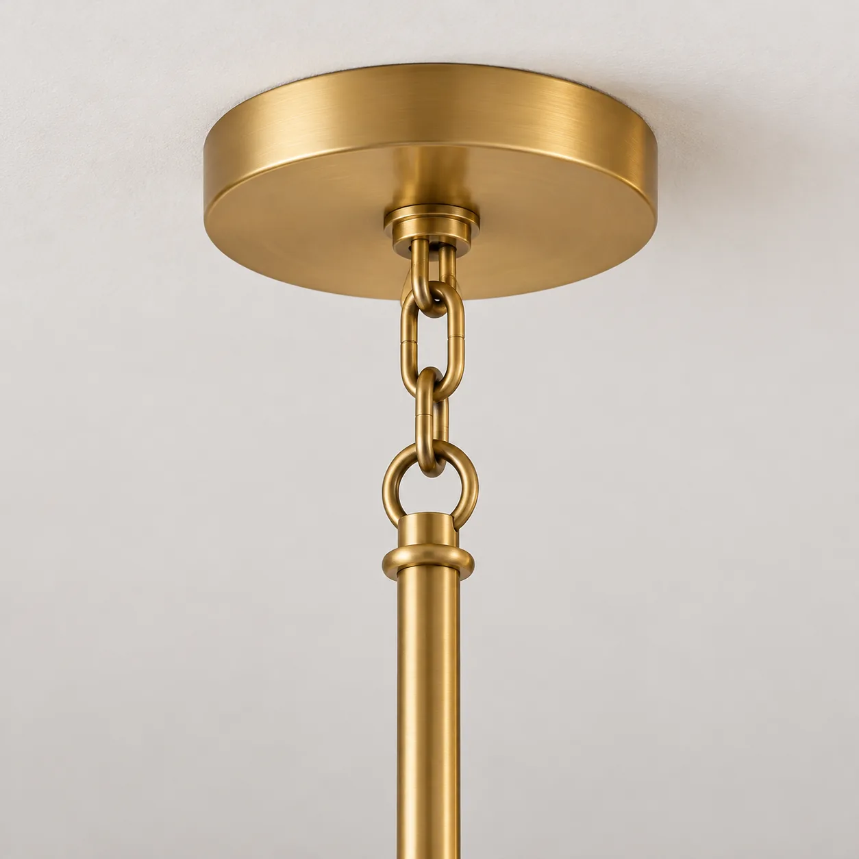 Close view of the round canopy, chain, and stem